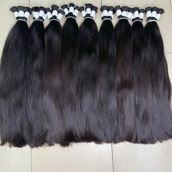 Nine natural black bundles laid out after sorting